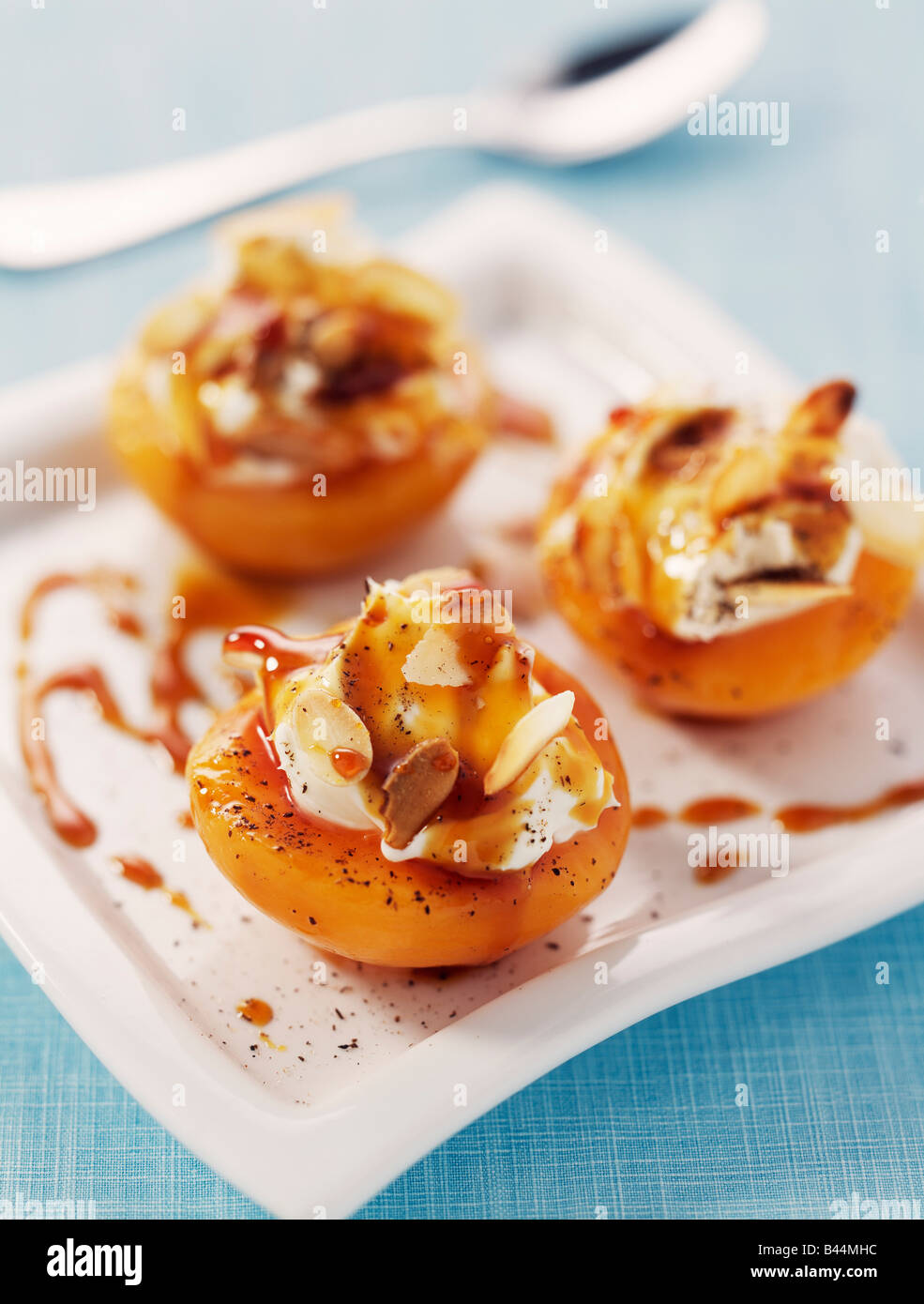 Grilled peaches with mascarpone and honey Stock Photo Alamy