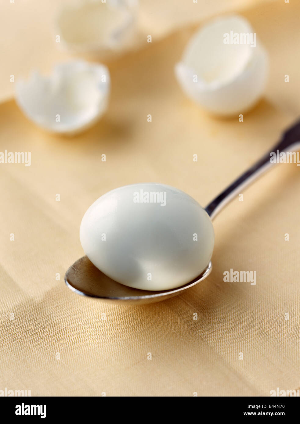 Hard boiled egg on a spoon Stock Photo - Alamy