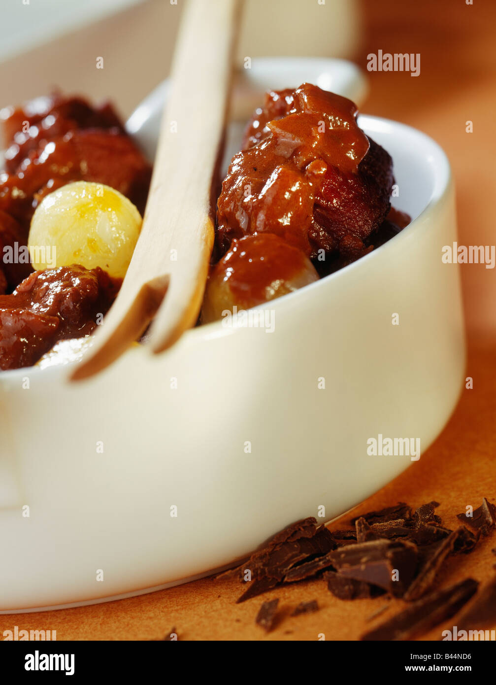 Wild boar stew with chocolat sauce Stock Photo Alamy