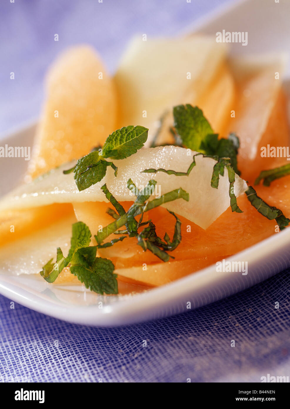 Fruit salad in melon slice hi-res stock photography and images - Alamy