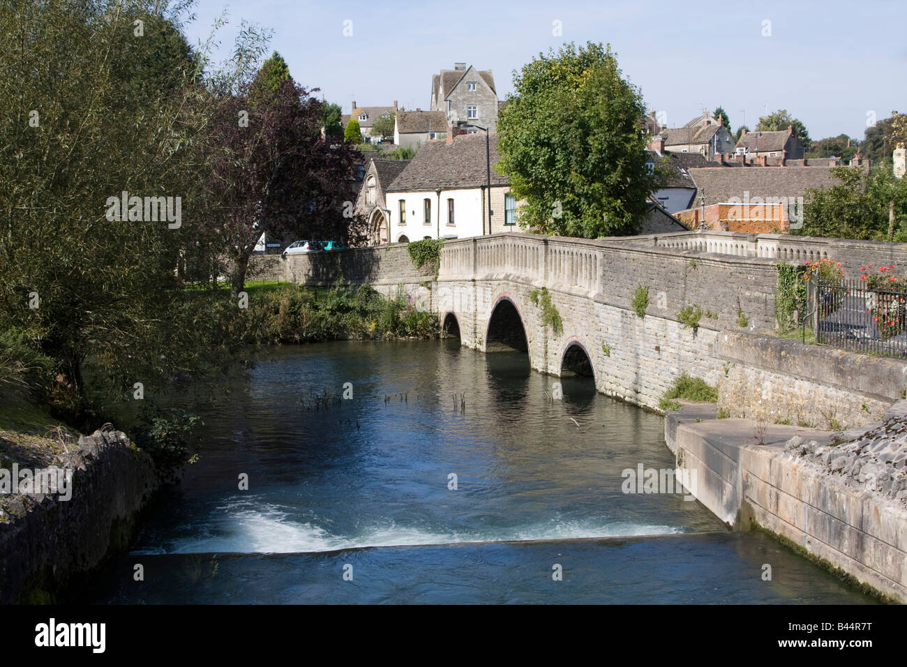 stone arched bridge  Malmesbury town centre wiltshire england uk gb Stock Photo