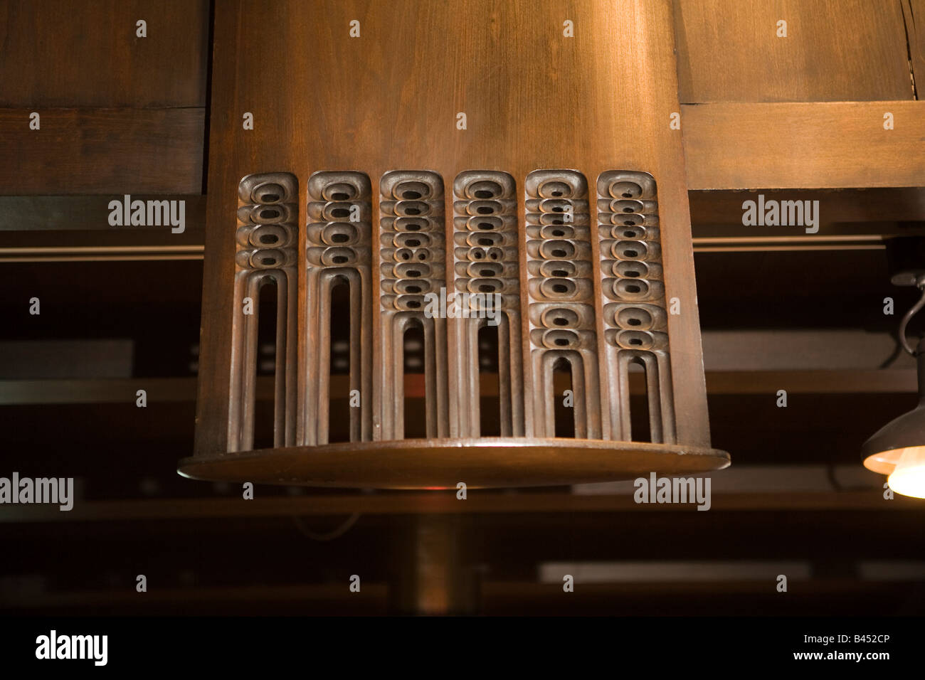 UK Scotland Glasgow School of Art interior the Library detail of carved wooden balcony decoration Stock Photo