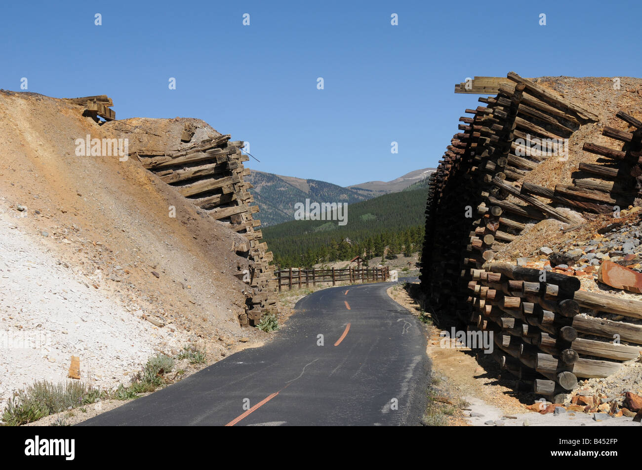 The Greenback Crib Wall which allowed the DRG Railroad to cross the line of the C and S line. The Mineral Belt Trail, Leadville, Stock Photo