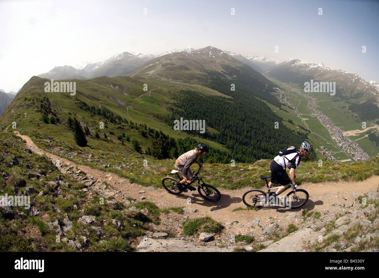 Mountain biking above Livigno in the Italian Alps Stock Photo - Alamy