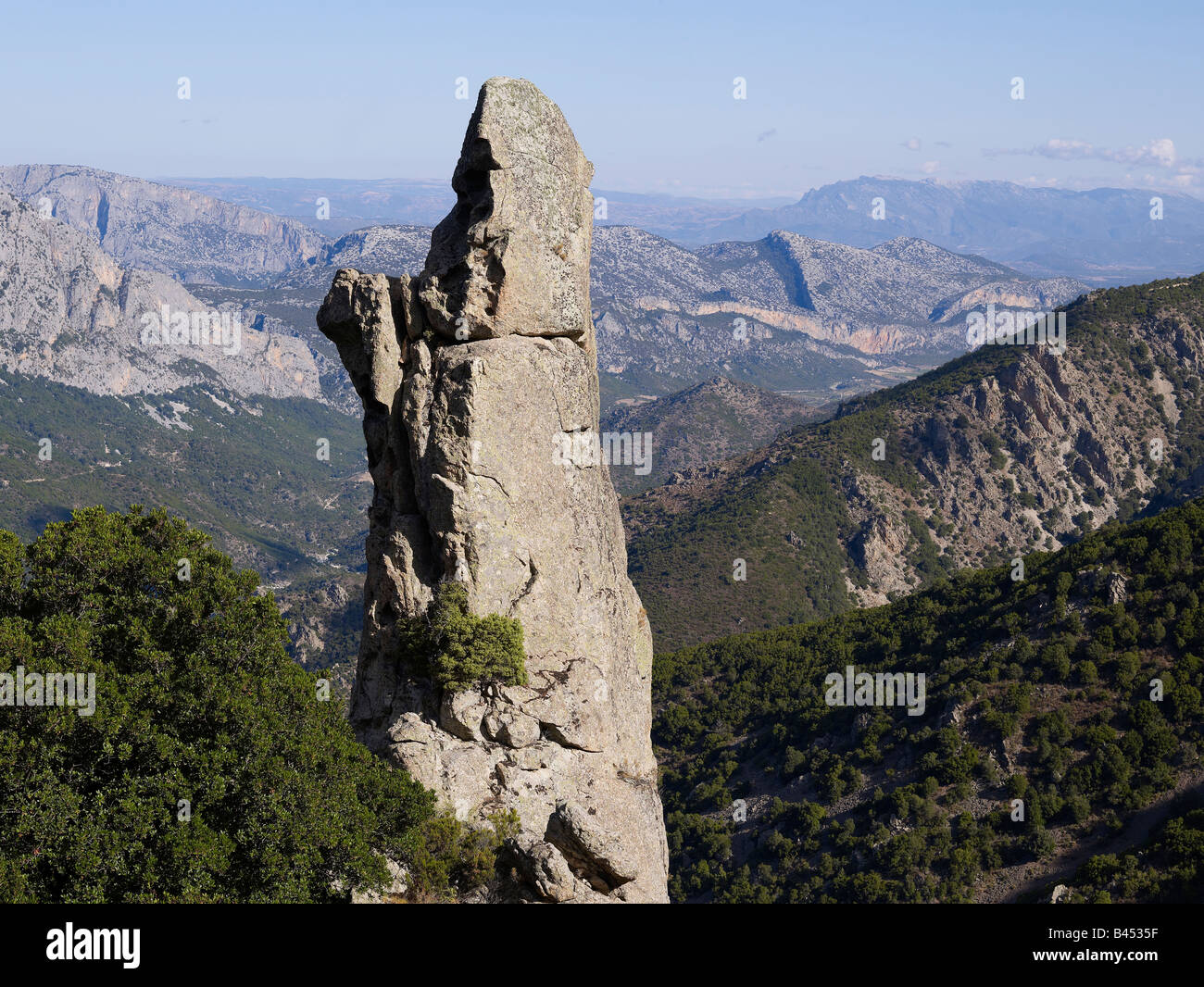 A mighty limestone rock at the east coast of Sardinia near Golfo di Orosei Stock Photo