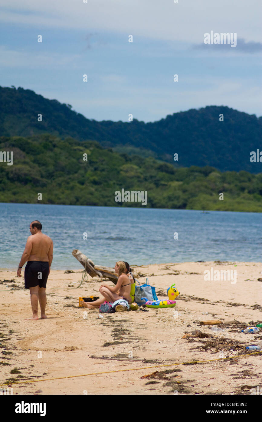 Panama, Isla Grande, Tourists enjoy the view in a bay of Caribbean islands vacation Stock Photo