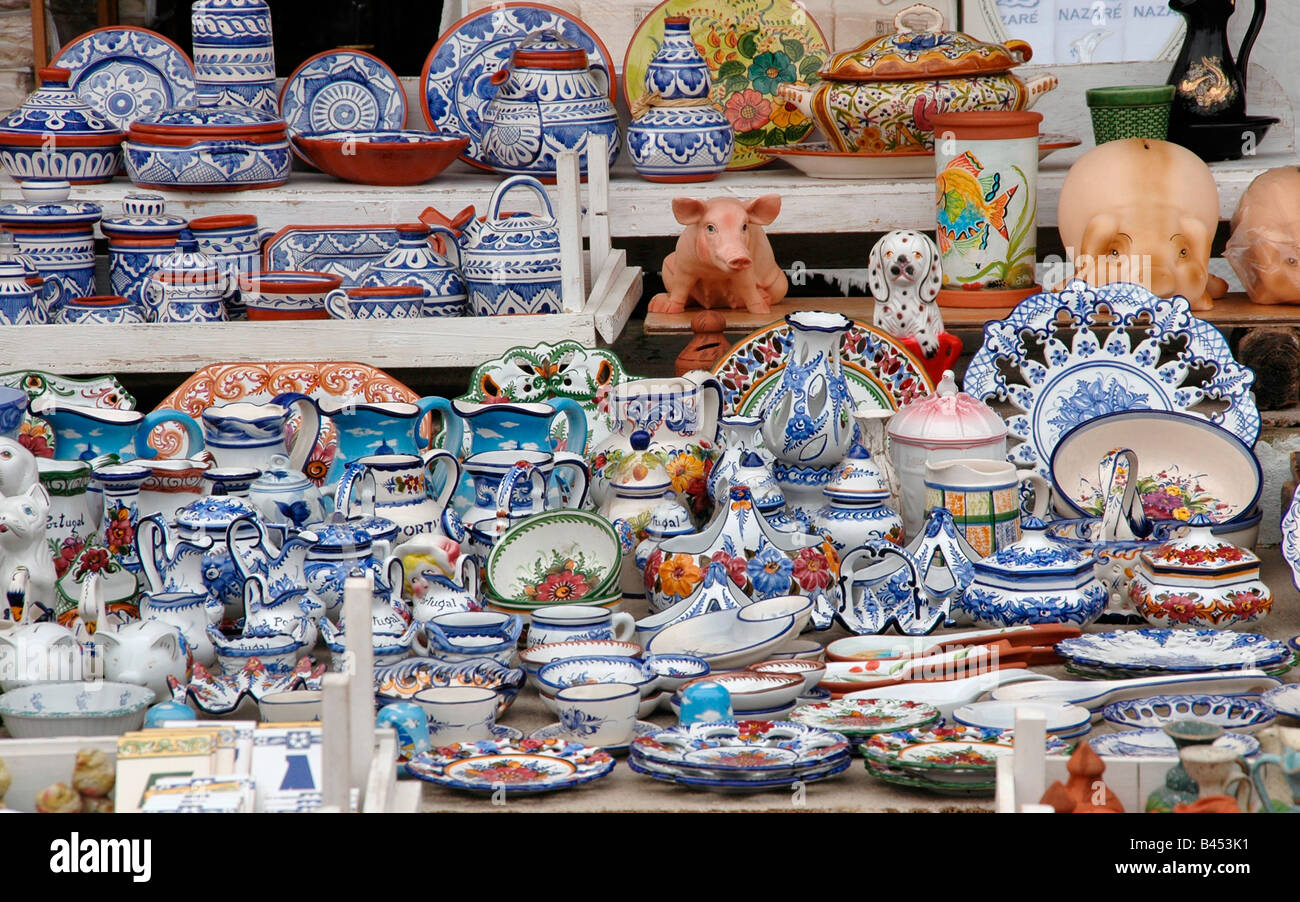 A stall in Nazare, Portugal selling Portuguese ware. Stock Photo