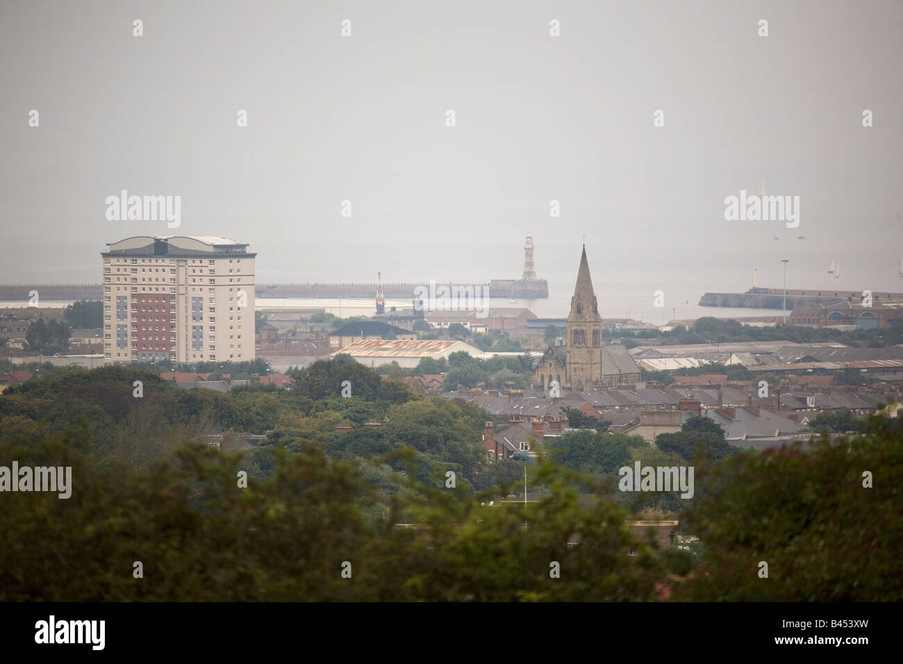 Two aspects of Sunderland, England. The city has both heavy industry and high rise housing and green parks. Stock Photo