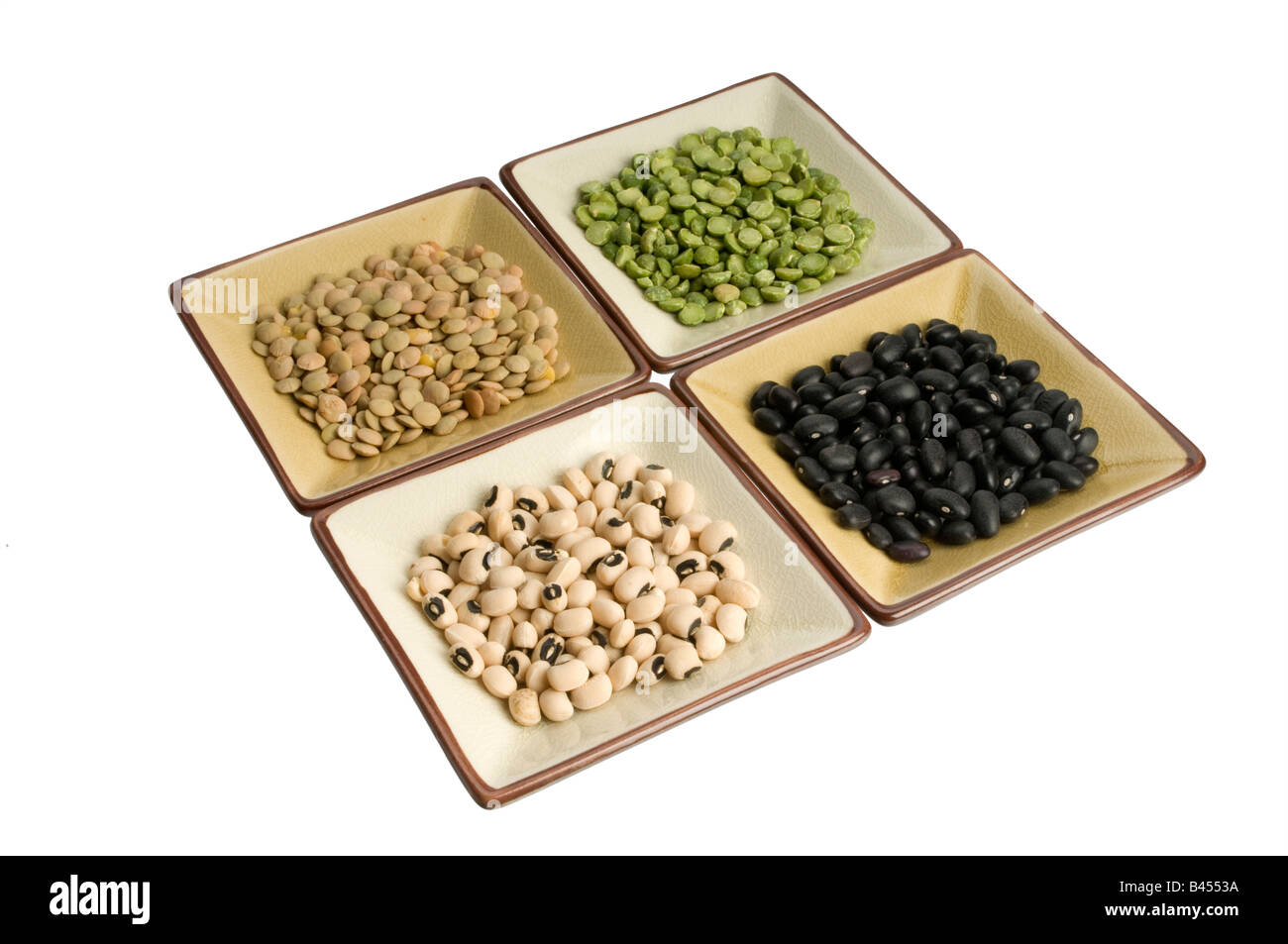 four dishes of lentils, peas, beans, black eyed peas Stock Photo Alamy