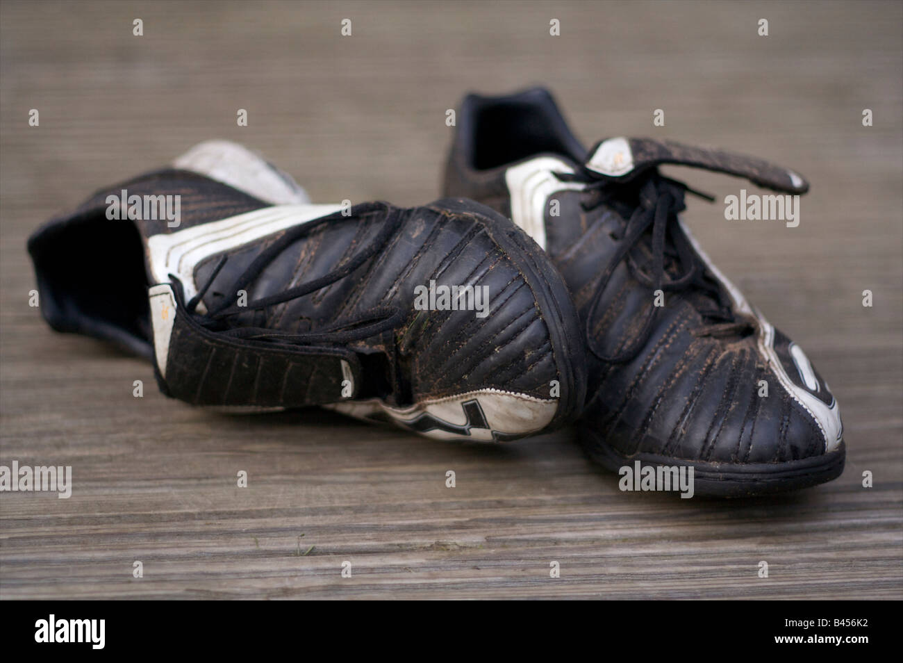 Trainers football boots dirty hires stock photography and images Alamy