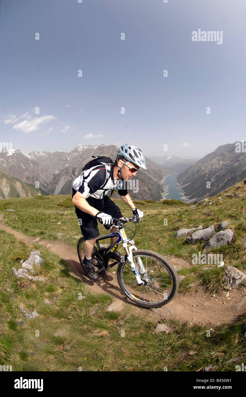 Mountain biking above Livigno in the Italian Alps Stock Photo - Alamy