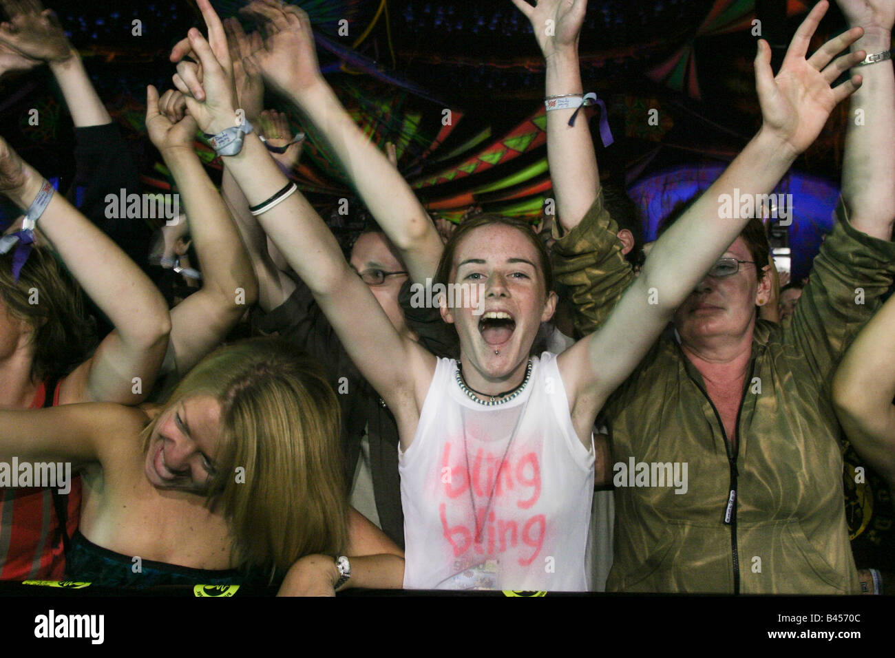 Enthusiastic audience for Fatboy Slim in the Dance Tent Glastonbury Music Festival 2003 Held in Somerset, UK Stock Photo