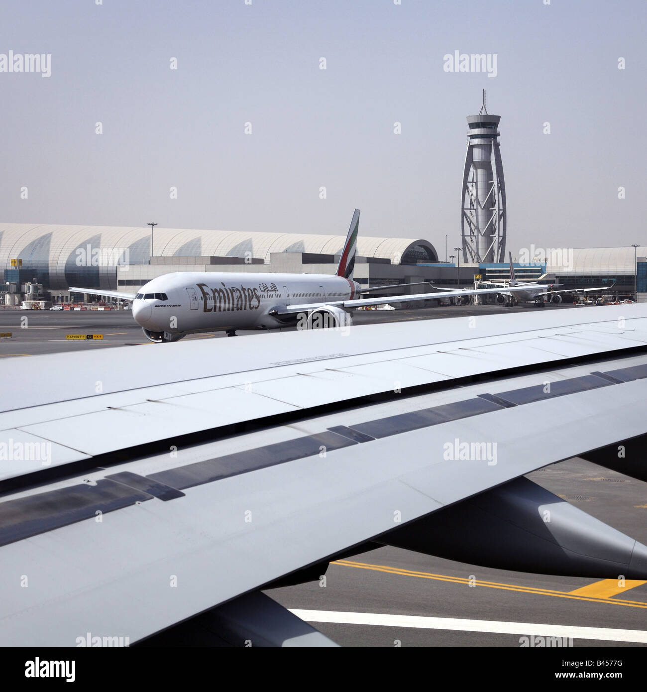 passenger airplanes in Dubai airport Stock Photo