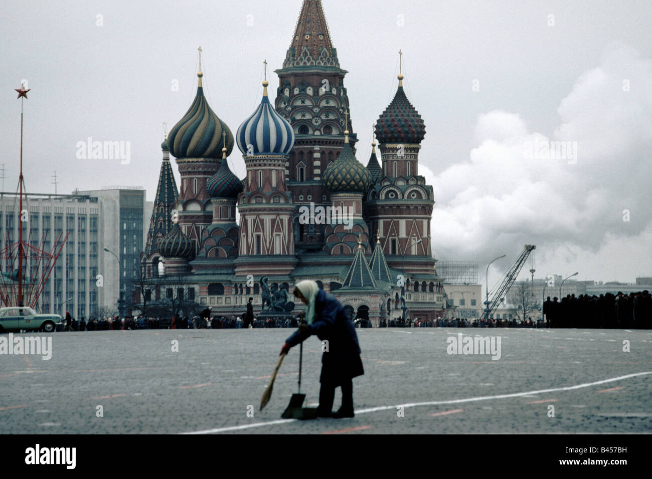 Woman sweeping in Red Square, Moscow Stock Photo