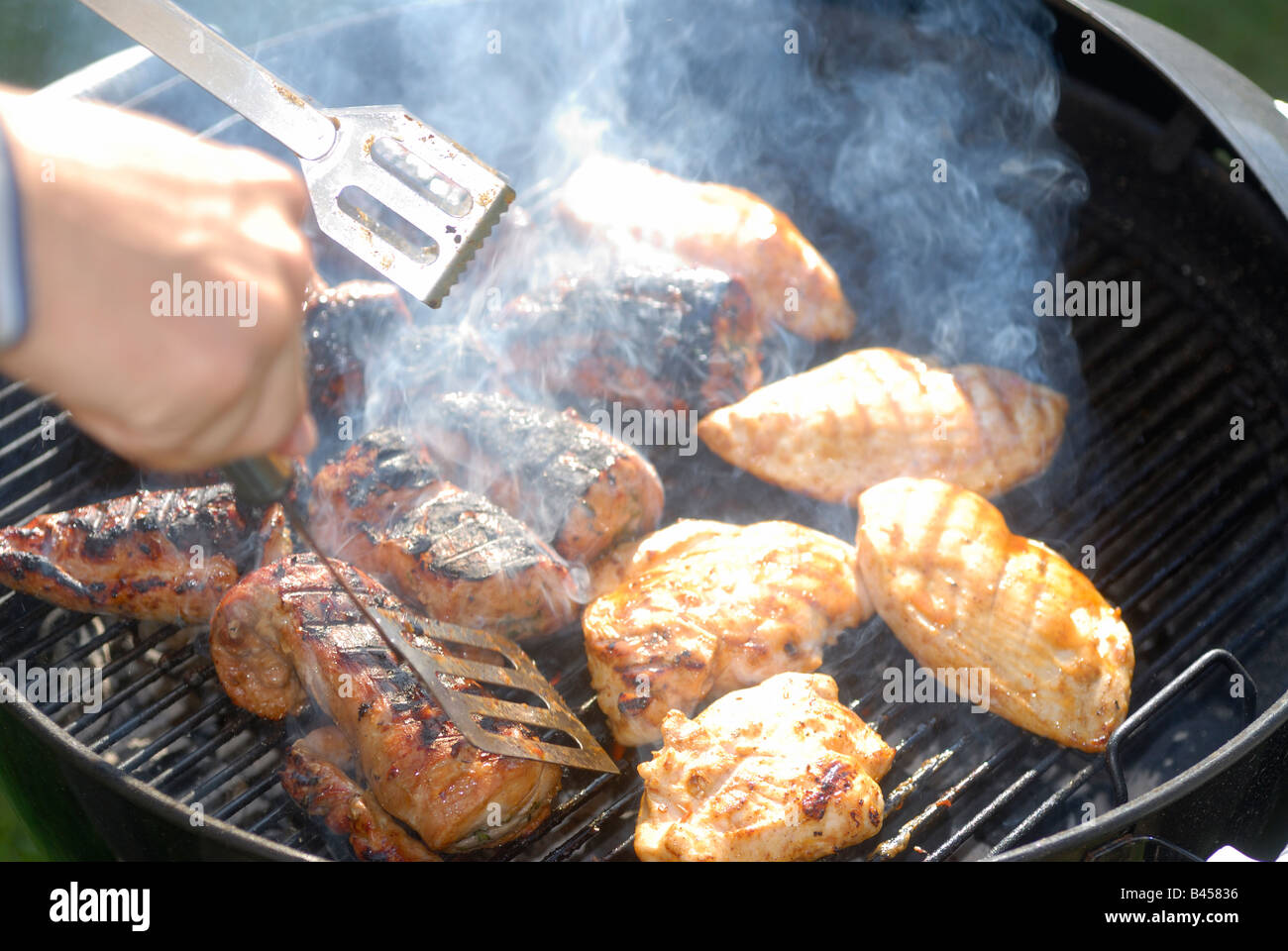 barbecue on summer night, Sweden Stock Photo