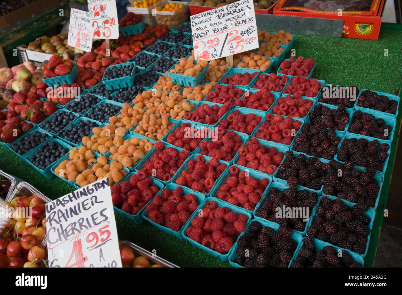Berries and cherries on stall Pike Place Farmers Market Seattle