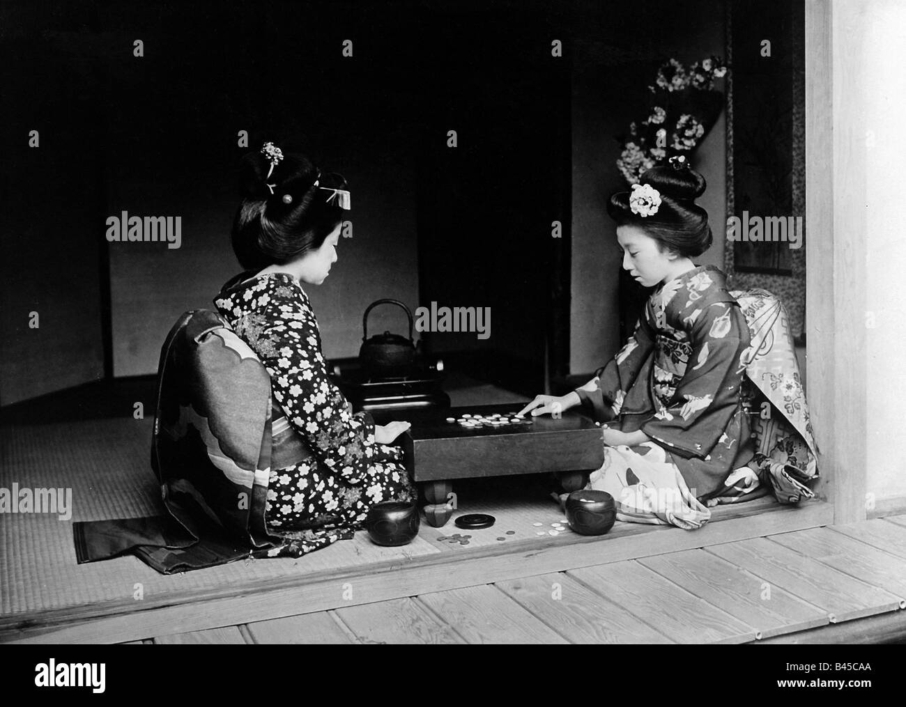 games, board game, Japanese women playing board game, circa 1900, Stock Photo