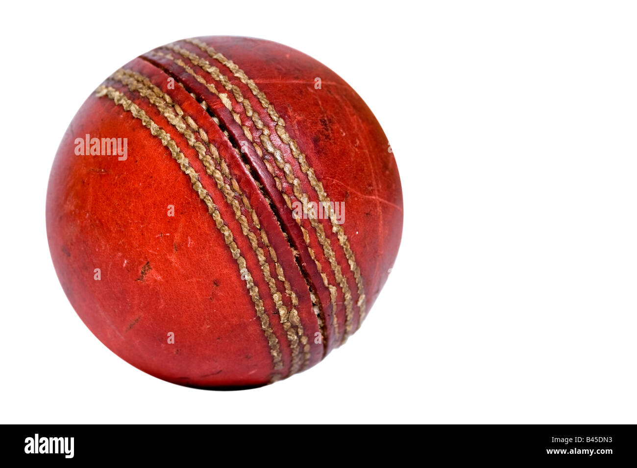 Old cricket ball isolated on white background Stock Photo