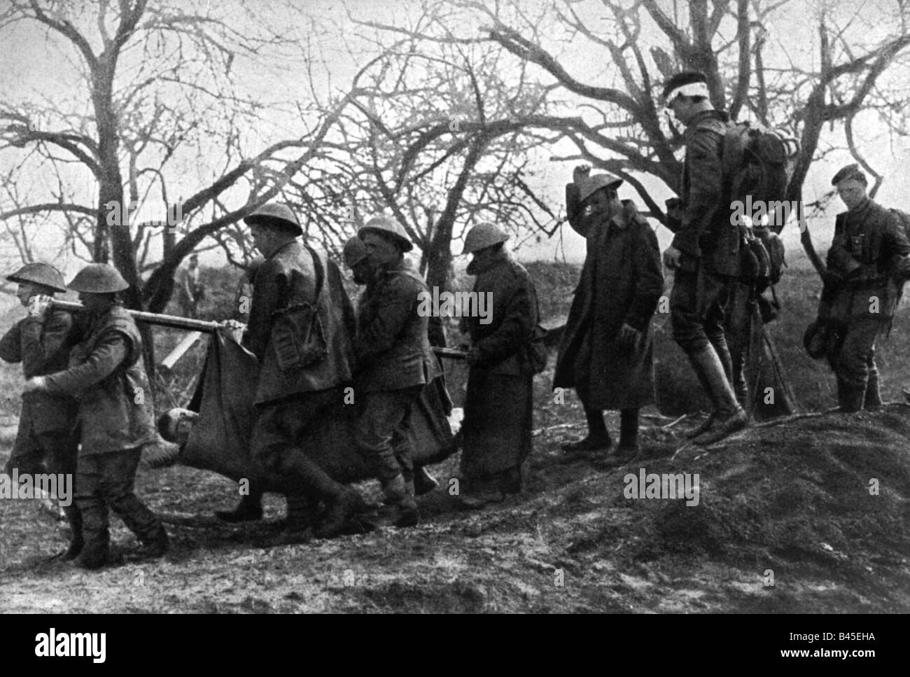 events, First World War / WWI, Western Front, German spring offensive 1918, captured British soldiers carrying wounded comrade, near St. Quentin, France, April 1918, Stock Photo