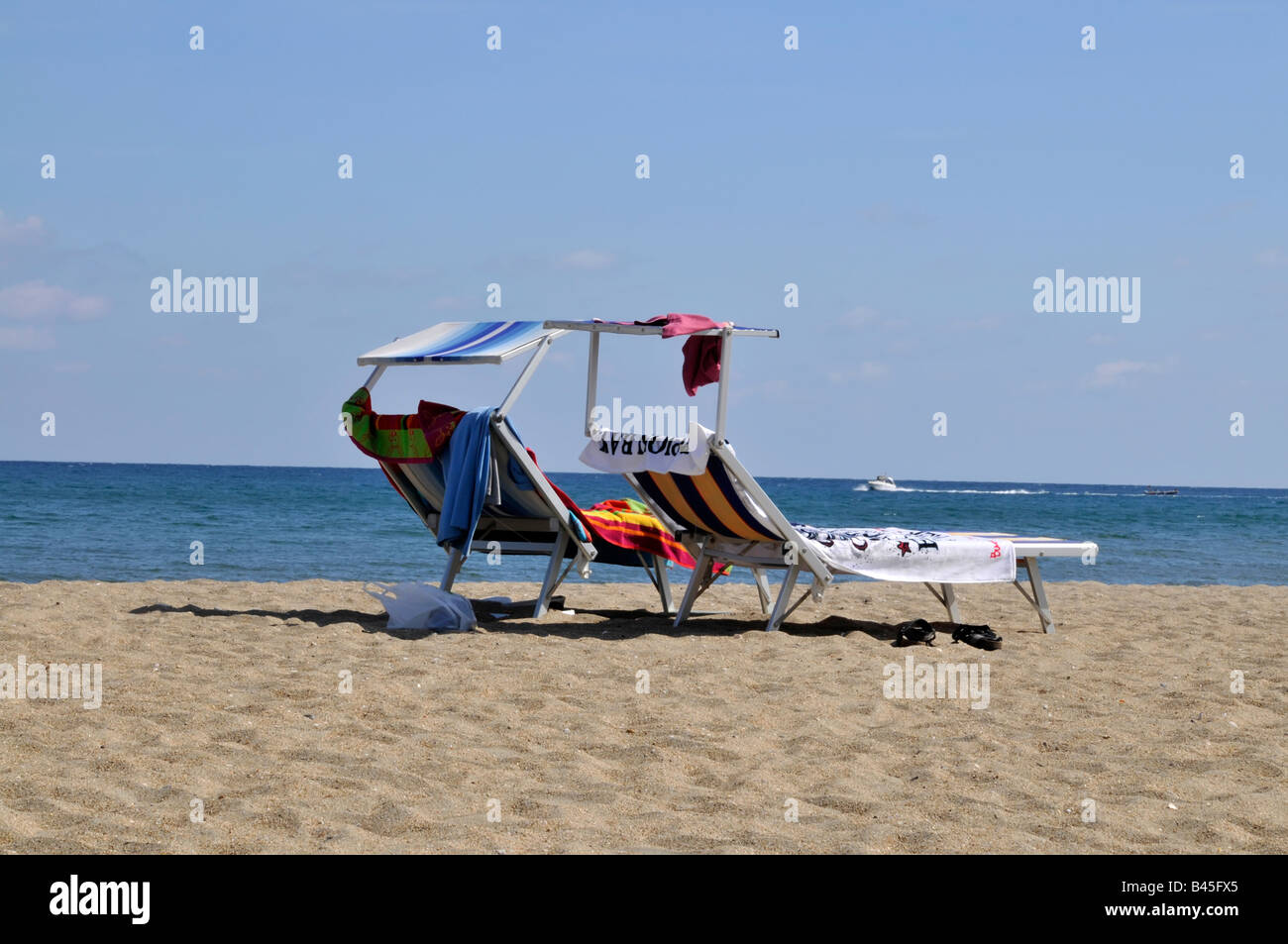 two sun beds on the beach Stock Photo Alamy