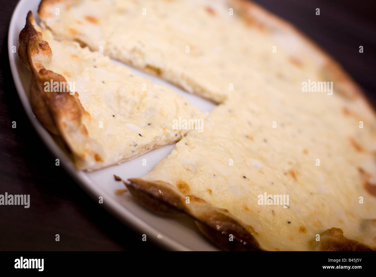 Four cheese pizza Stock Photo - Alamy