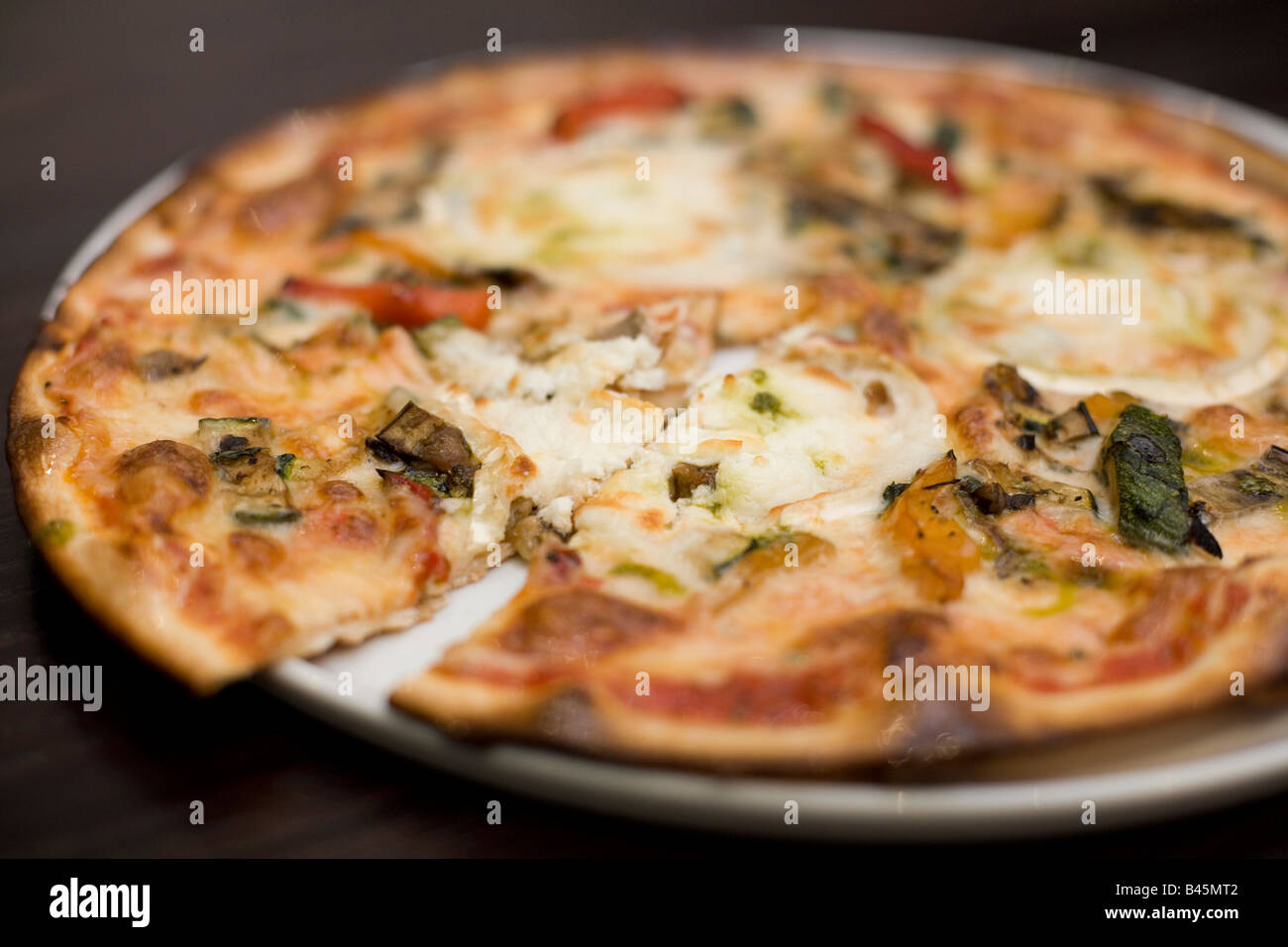 Goats cheese and roasted vegetable pizza Stock Photo Alamy