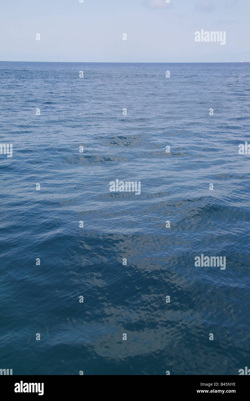 sun light reflection waves on sea water surface Stock Photo - Alamy