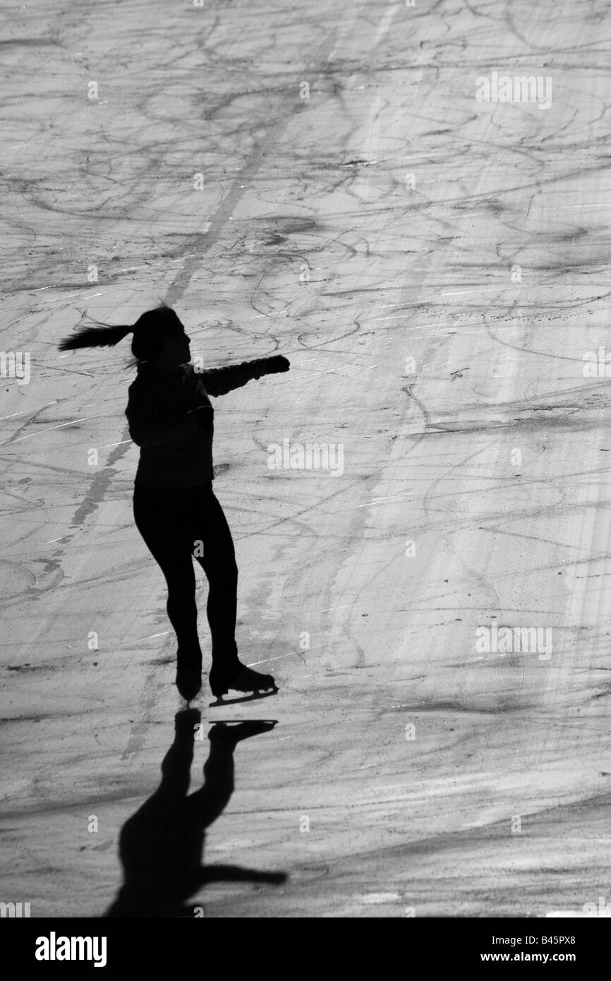 Silhouette of an ice skater Stock Photo