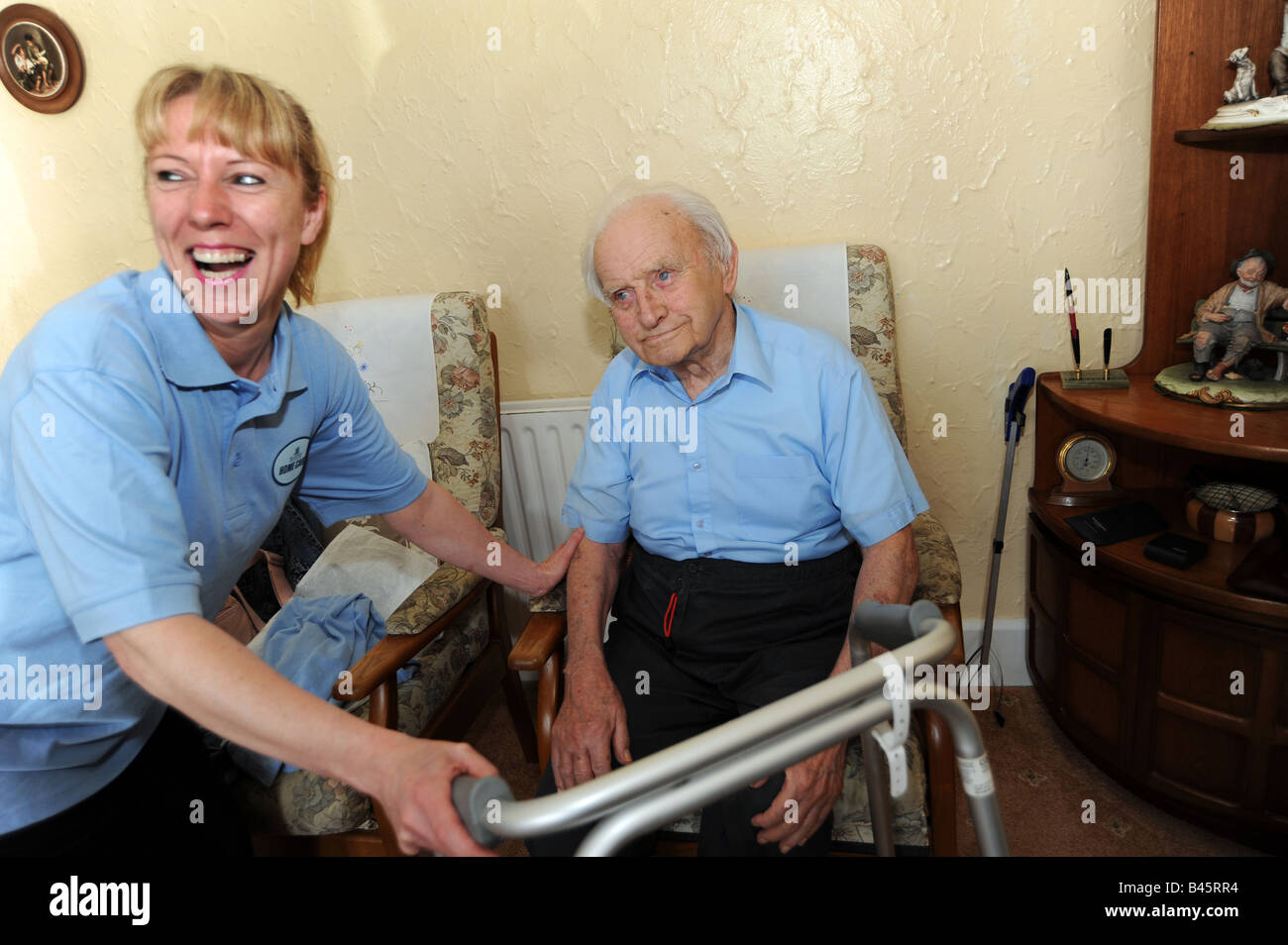 Council Homecare Staff enable elderly and disabled people to live in their own homes through support and help Stock Photo