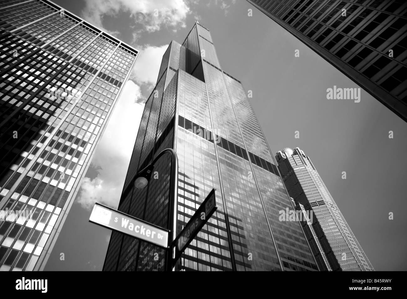 VIEW OF SEARS TOWER FROM THE CORNER OF WACKER DRIVE AND ADAMS STREET IN DOWNTOWN CHICAGO ILLINOIS USA Stock Photo