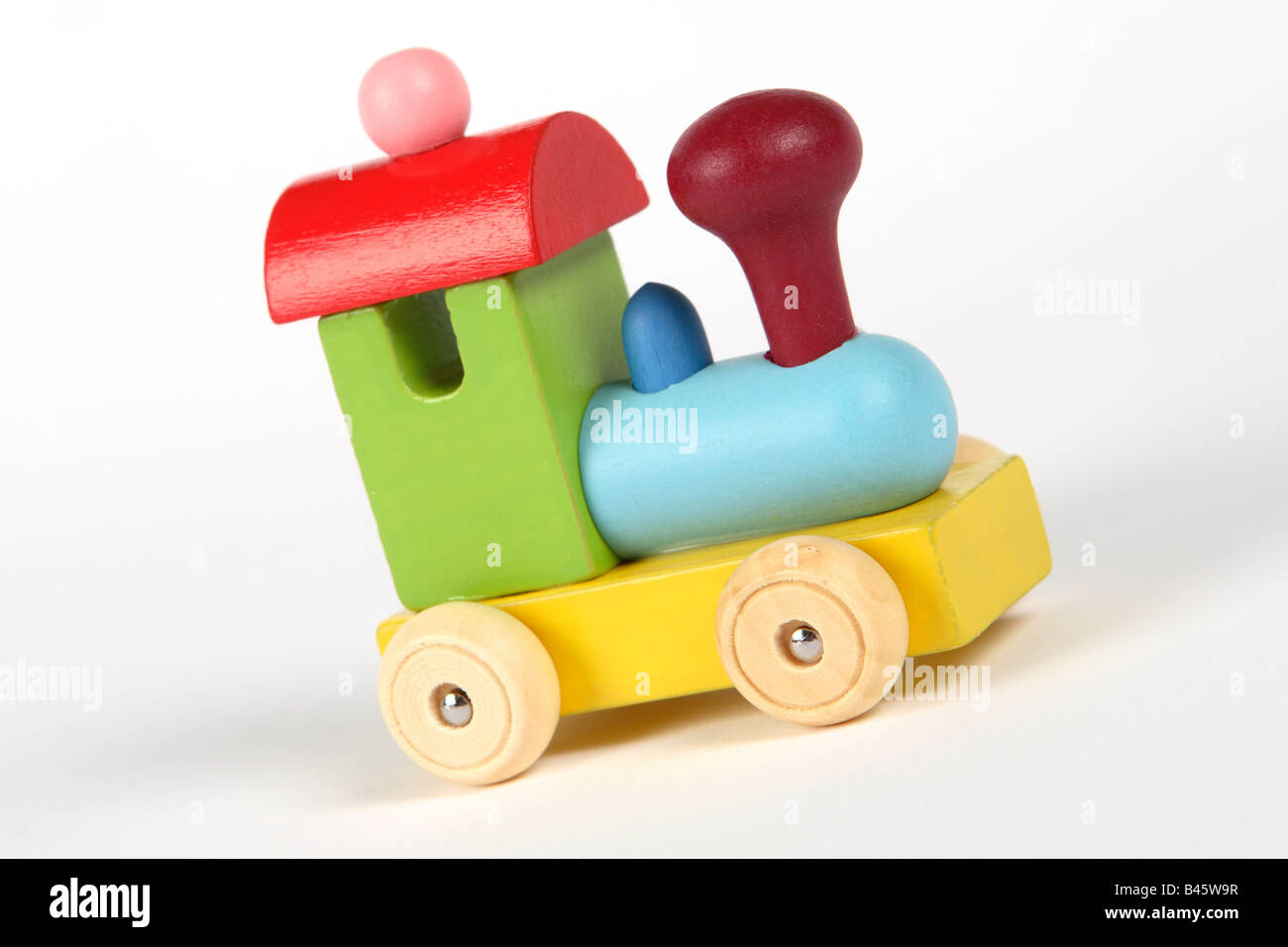 Wooden toy train engine designed for young children Stock
