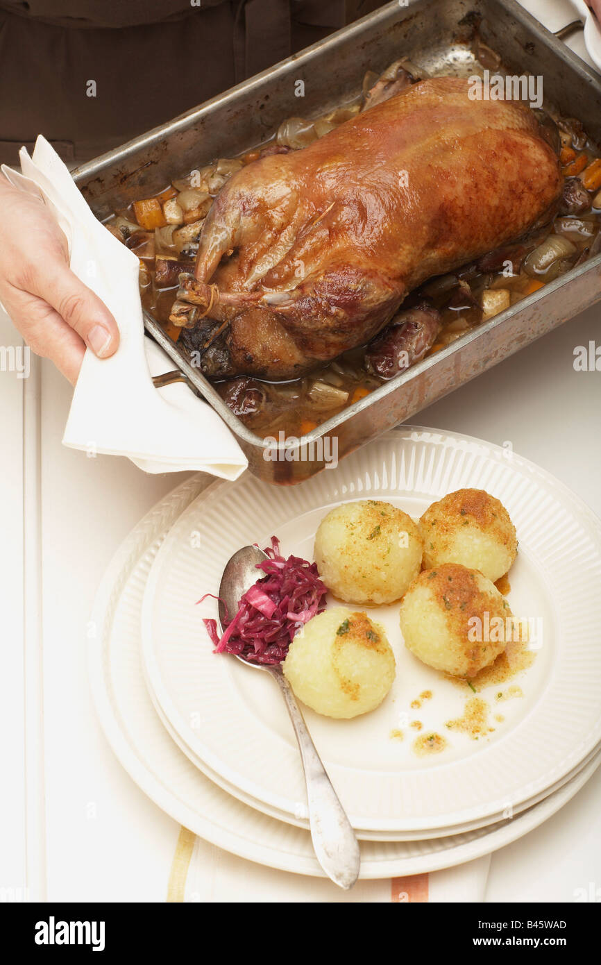 Roast duck in roasting tray, elevated view Stock Photo Alamy