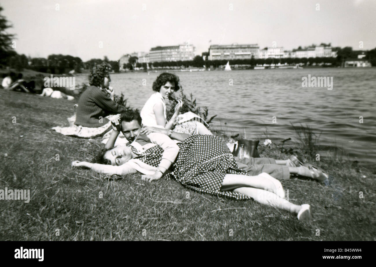 tourism, party, resting at Alster bank, Hamburg, May 1957, Stock Photo