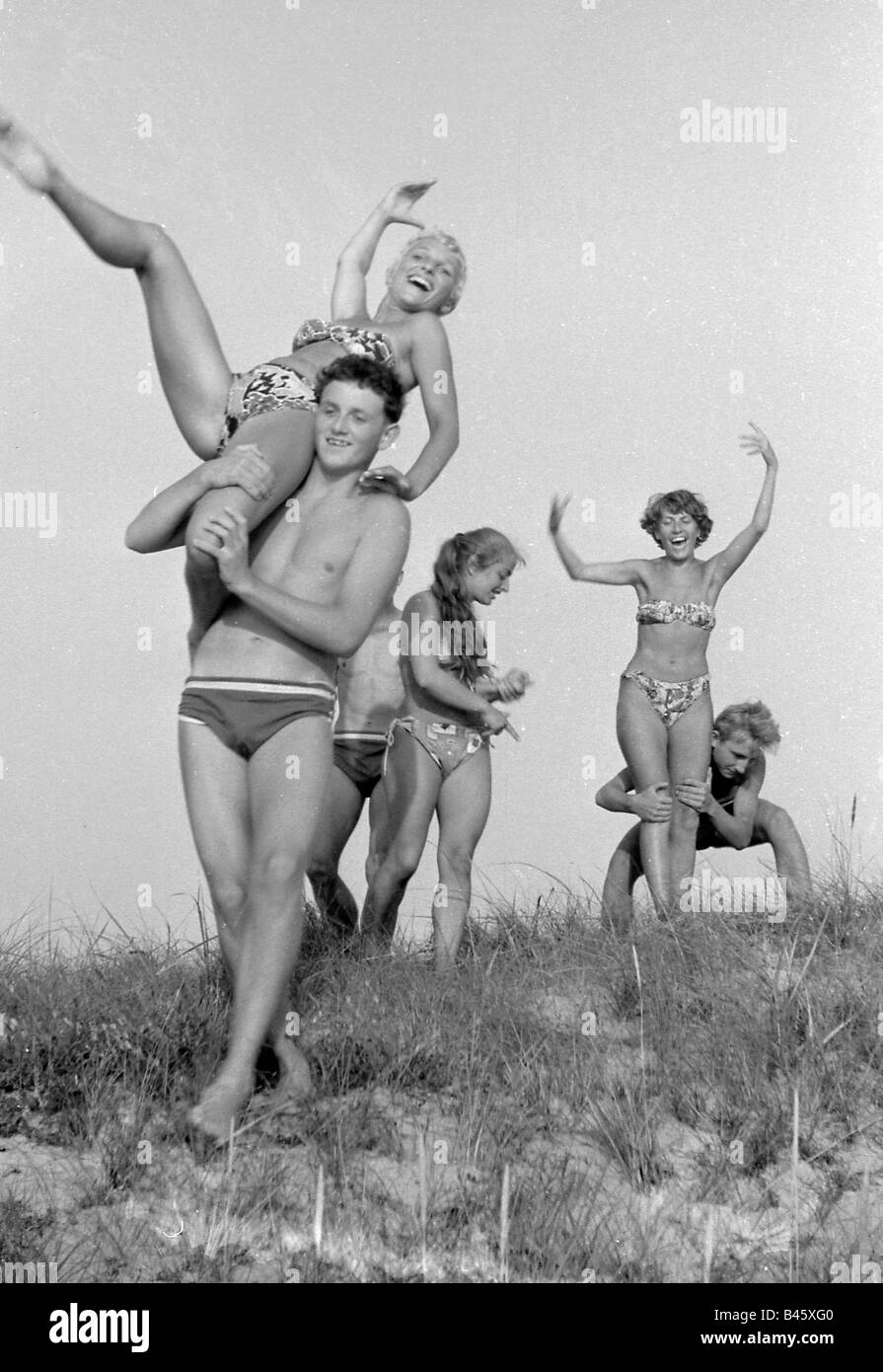 bathing, seaside ressort, Hiddensee, young people on the beach, 1957, Stock Photo