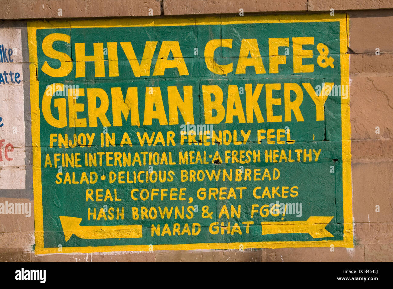 An advert for the Shiva Cafe and German Bakery in Varanasi, India Stock Photo Alamy