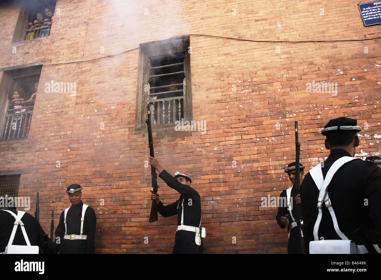 Nepalese soldiers dressed in historical uniforms shooting of the Indra Jatra festival Stock Photo
