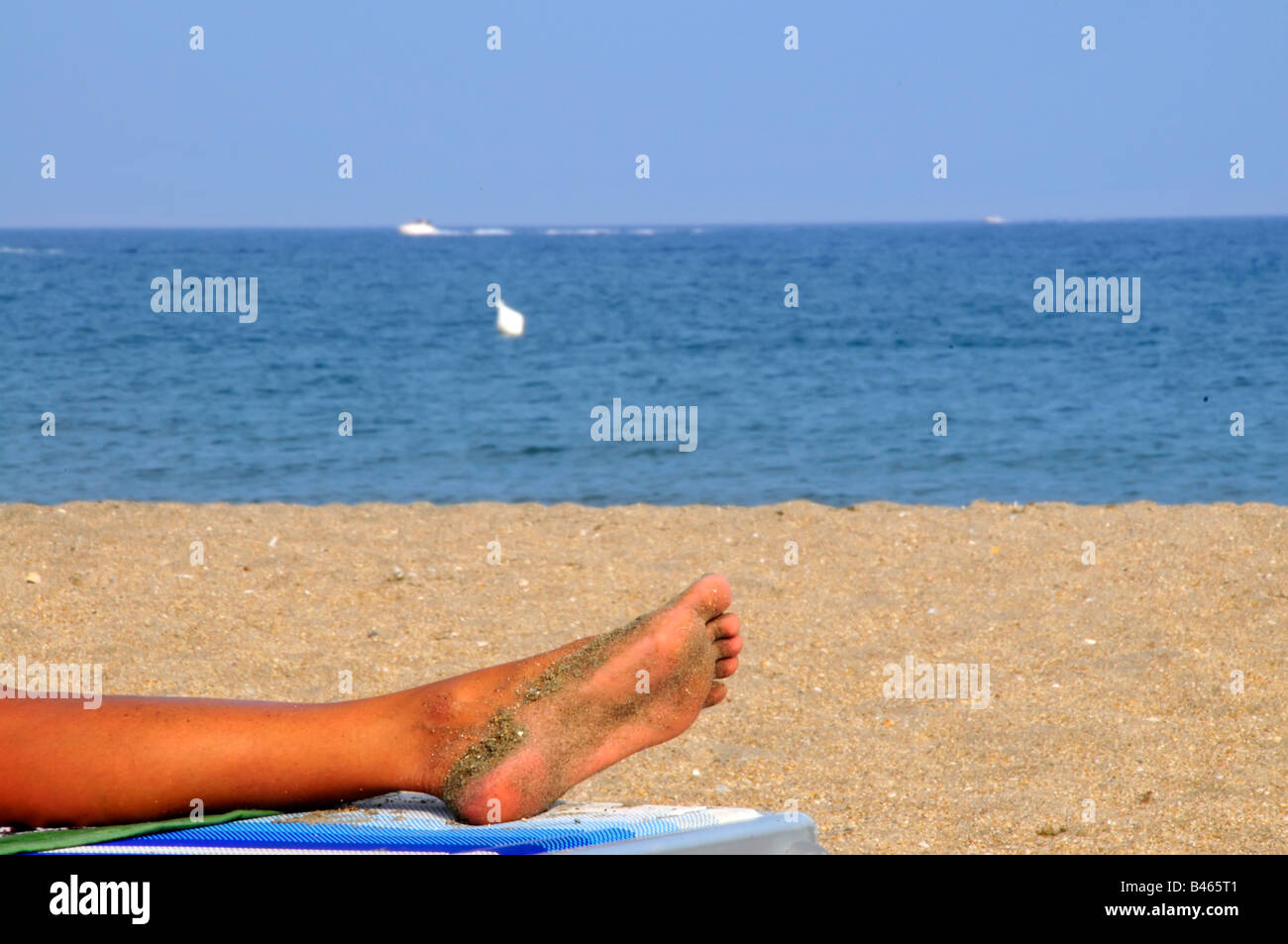 Woman On The Beach Stock Photo - Alamy