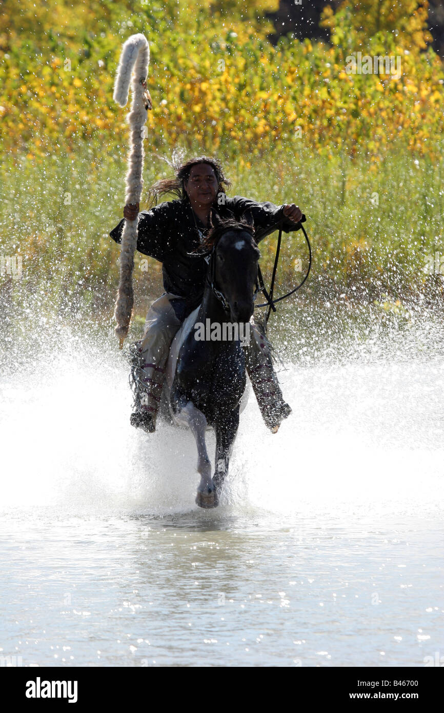 A Native American Sioux Indian on horseback who crossed a river on his ...