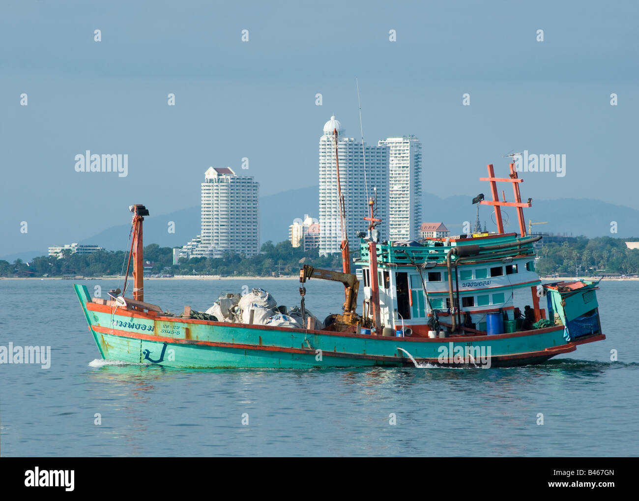 Traditional Thai fishing vessel used as a freighter at Pattaya Bay