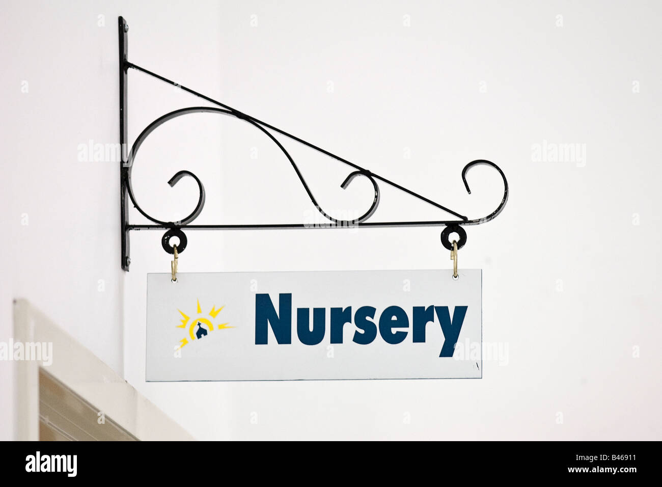 nursery sign hanging over doorway Stock Photo Alamy