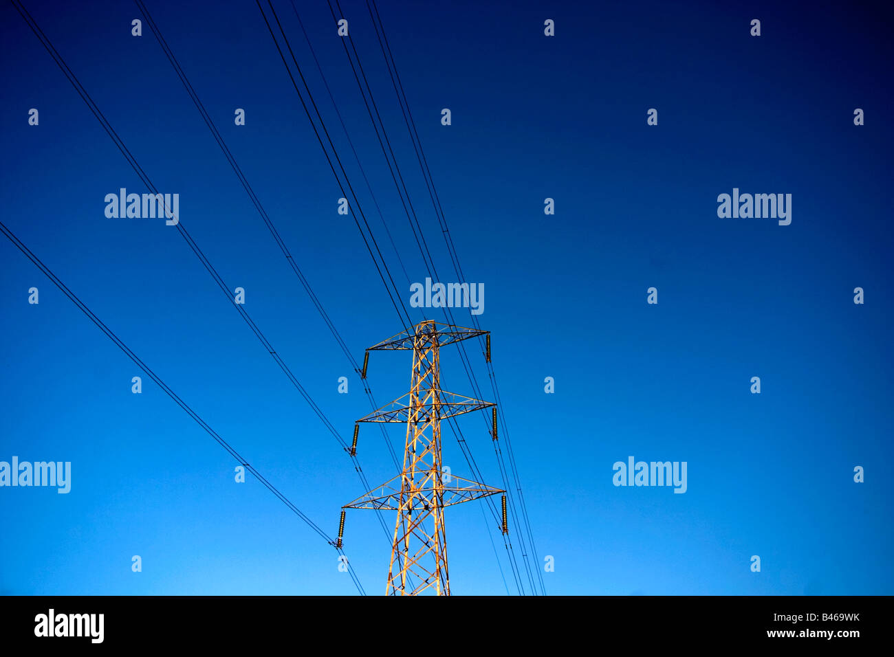 Electricity Pylon against a clear blue sky Stock Photo - Alamy