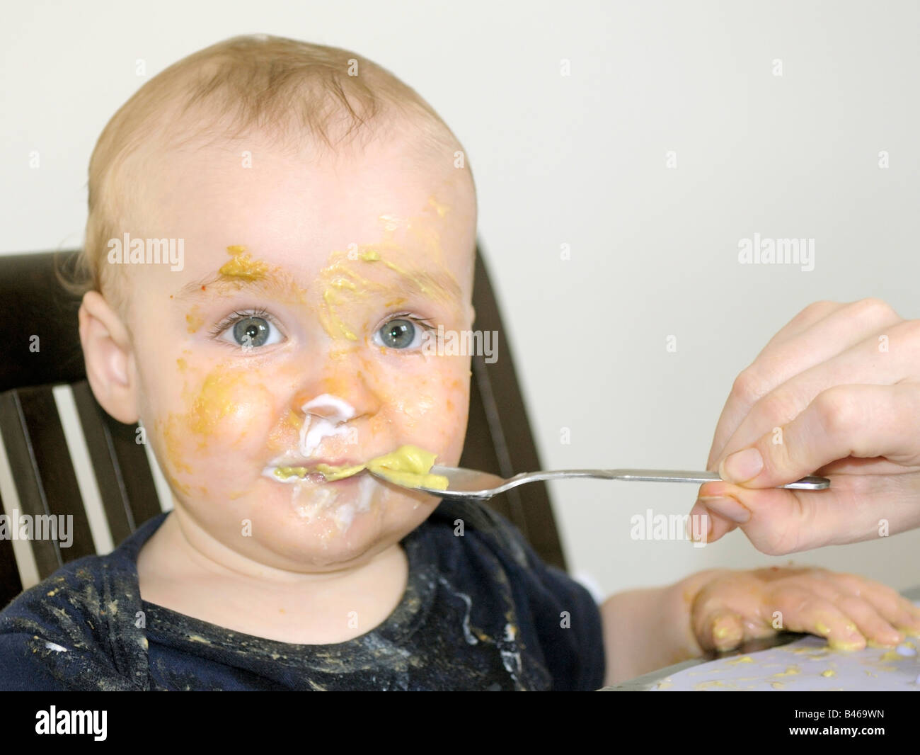 a-ten-month-old-baby-boy-at-mealtime-stock-photo-alamy