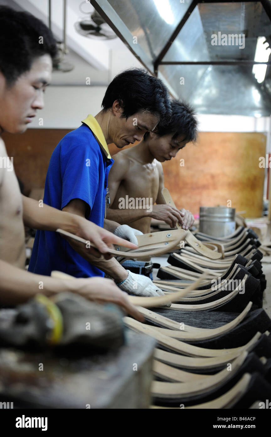 Chinese workers at a furniture factory in Huizhou Guangdong China. 21