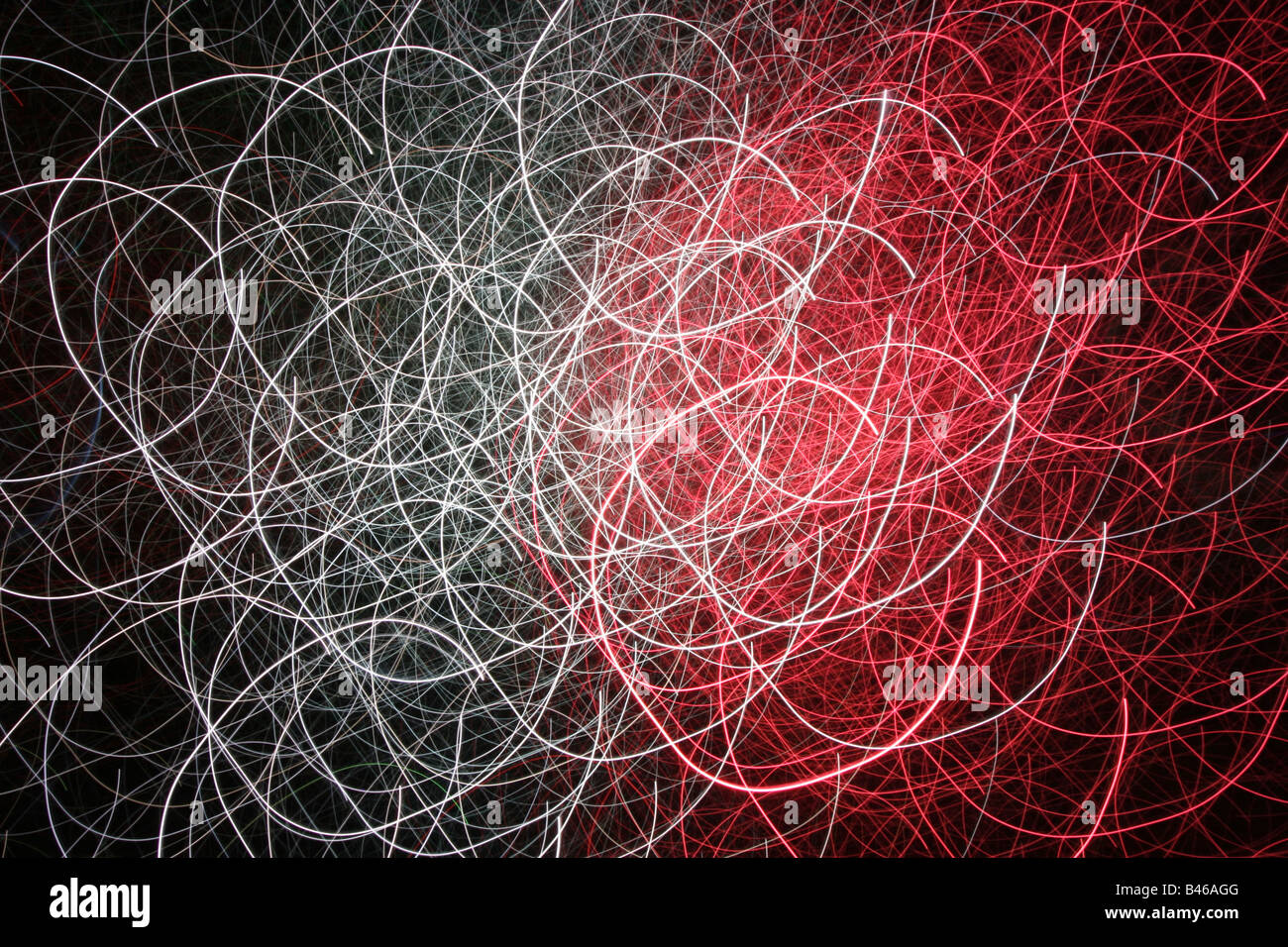 red and white loops exposed on a black background Stock Photo - Alamy