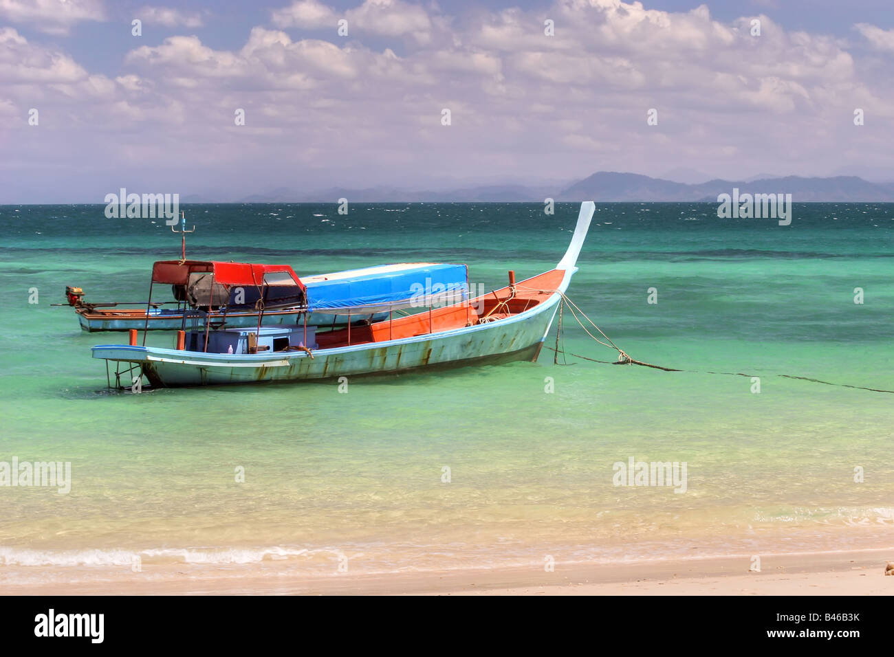 a boat on the colorful andaman sea ko bulon island thailand Stock Photo