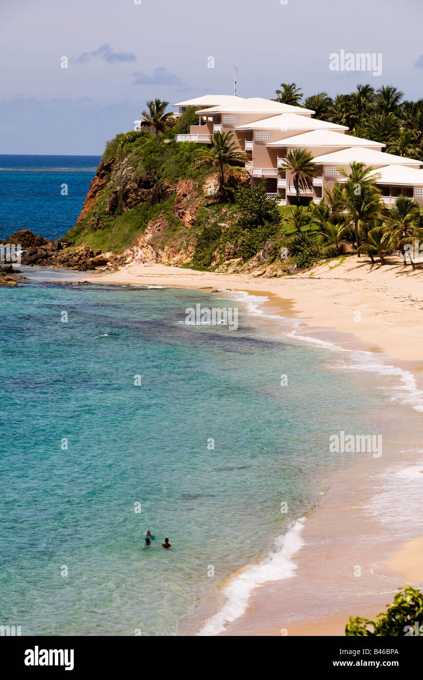 Boys playing in the sea at Curtain Bluff Beach on the Carribean island of Antigua Stock Photo