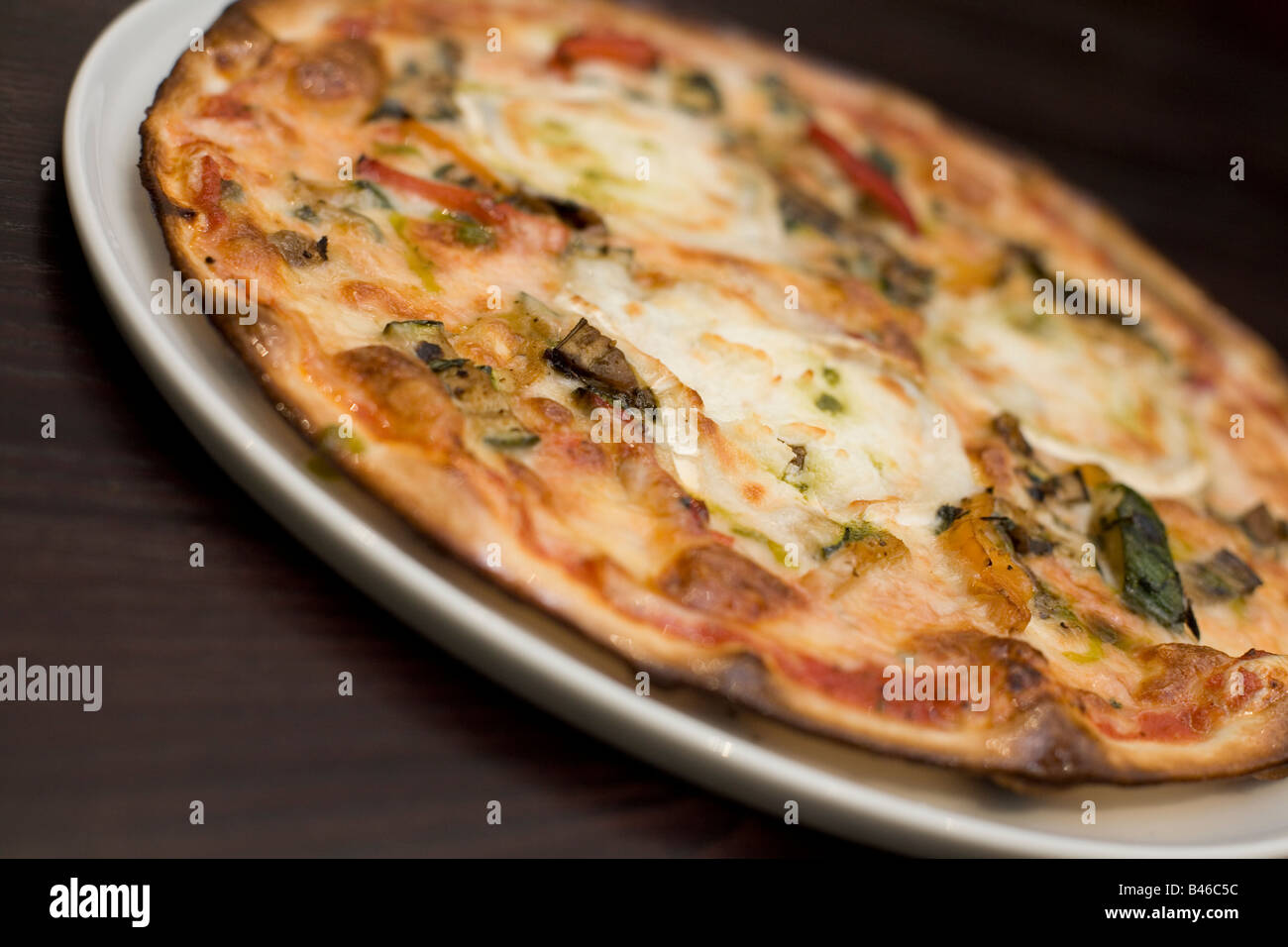Goats cheese and roasted vegetable pizza Stock Photo Alamy