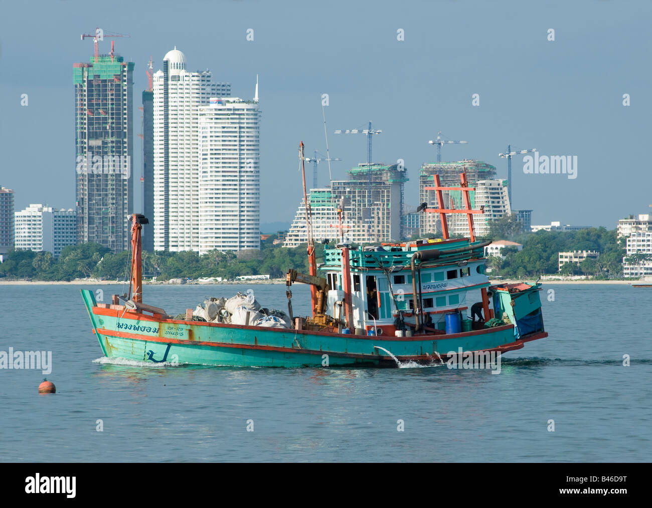 Traditional Thai fishing vessel used as a freighter at Pattaya Bay