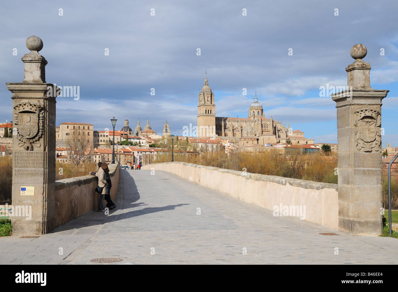 Roman bridge over the Rio Tormes Old and New Cathedrals Salamanca Spain Stock Photo
