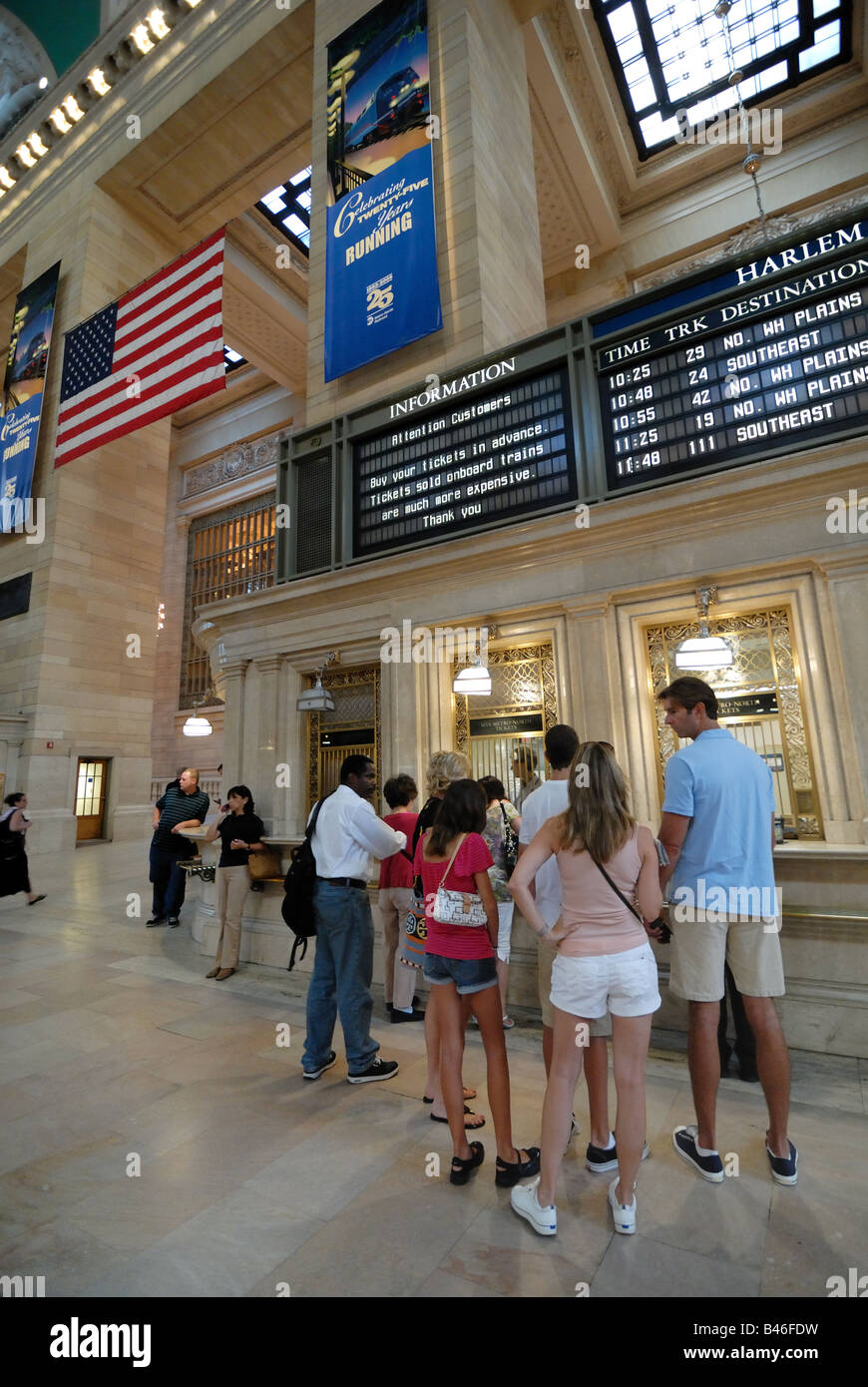 Travelers and tourists wait to purchase tickets at Grand Central Station, New York, New York Stock Photo